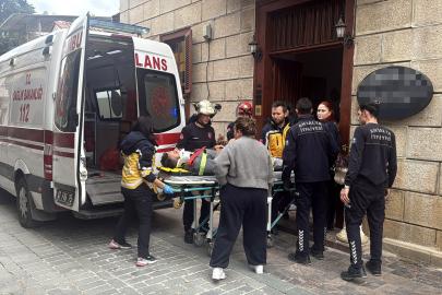 Depoya inmeye çalışırken düşüp yaralandı