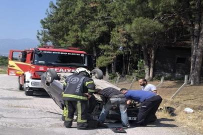 Takla atan araçta sıkışan çocuk itfaiye ekiplerince kurtarıldı